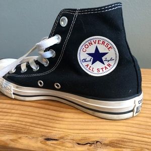 Black high top Chuck Taylor’s